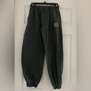 Brandy Melville dark green “boston athletics” sweatpants. Ones size.